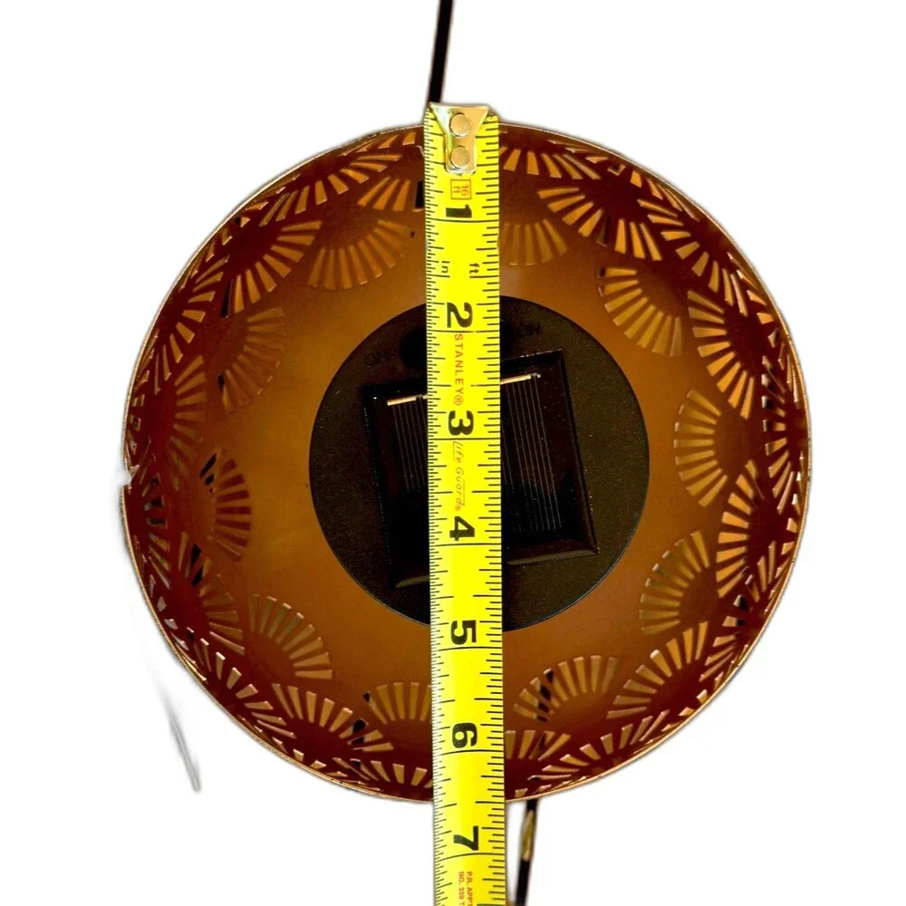 A Home Decor Solar Metal LED Flame Table Lamp Cutout Outdoor Lantern⁠